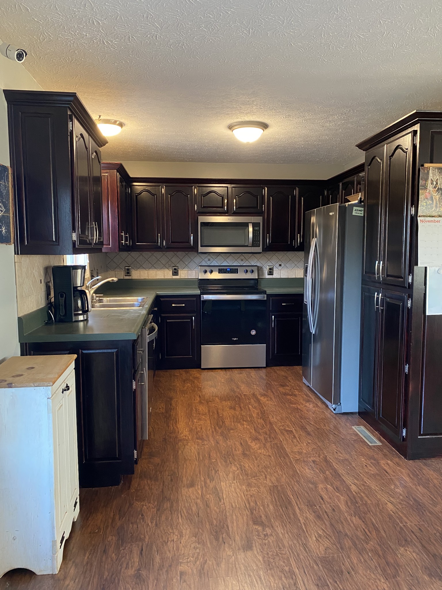 337 Lear Road Portland, TN 37148 - Photo 6 of 15 a kitchen with stainless steel appliances granite countertop a refrigerator stove and sink