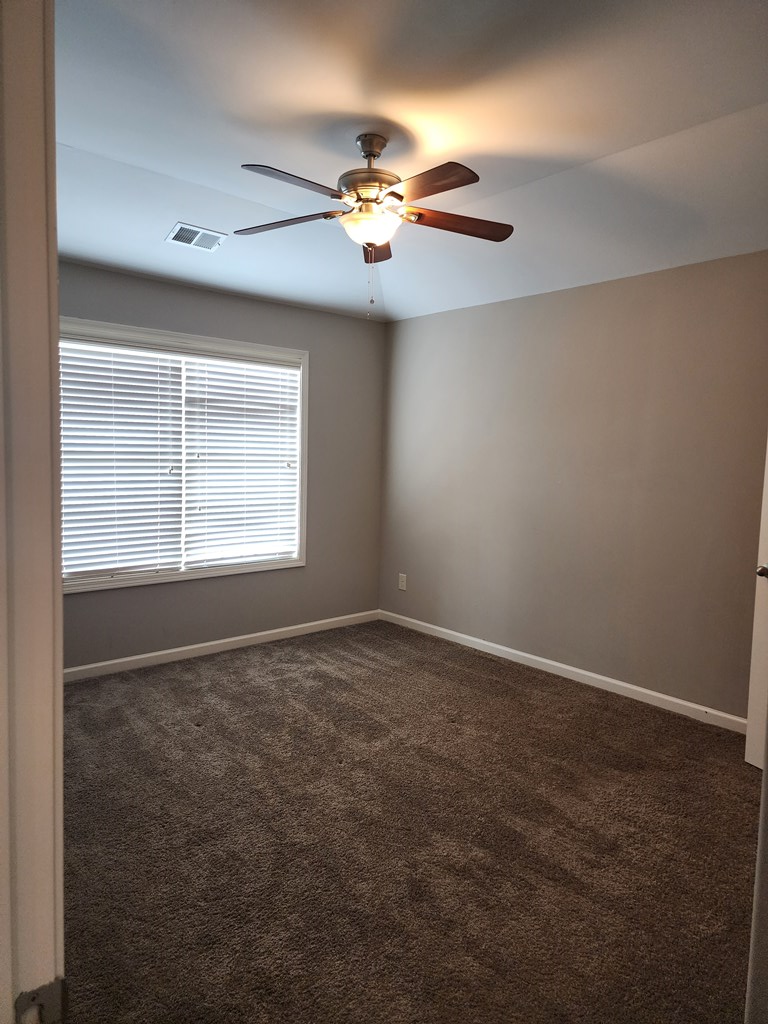 4924 Brightstar Lane Columbus, GA 31907 - Photo 13 of 21 a view of an empty room with a window