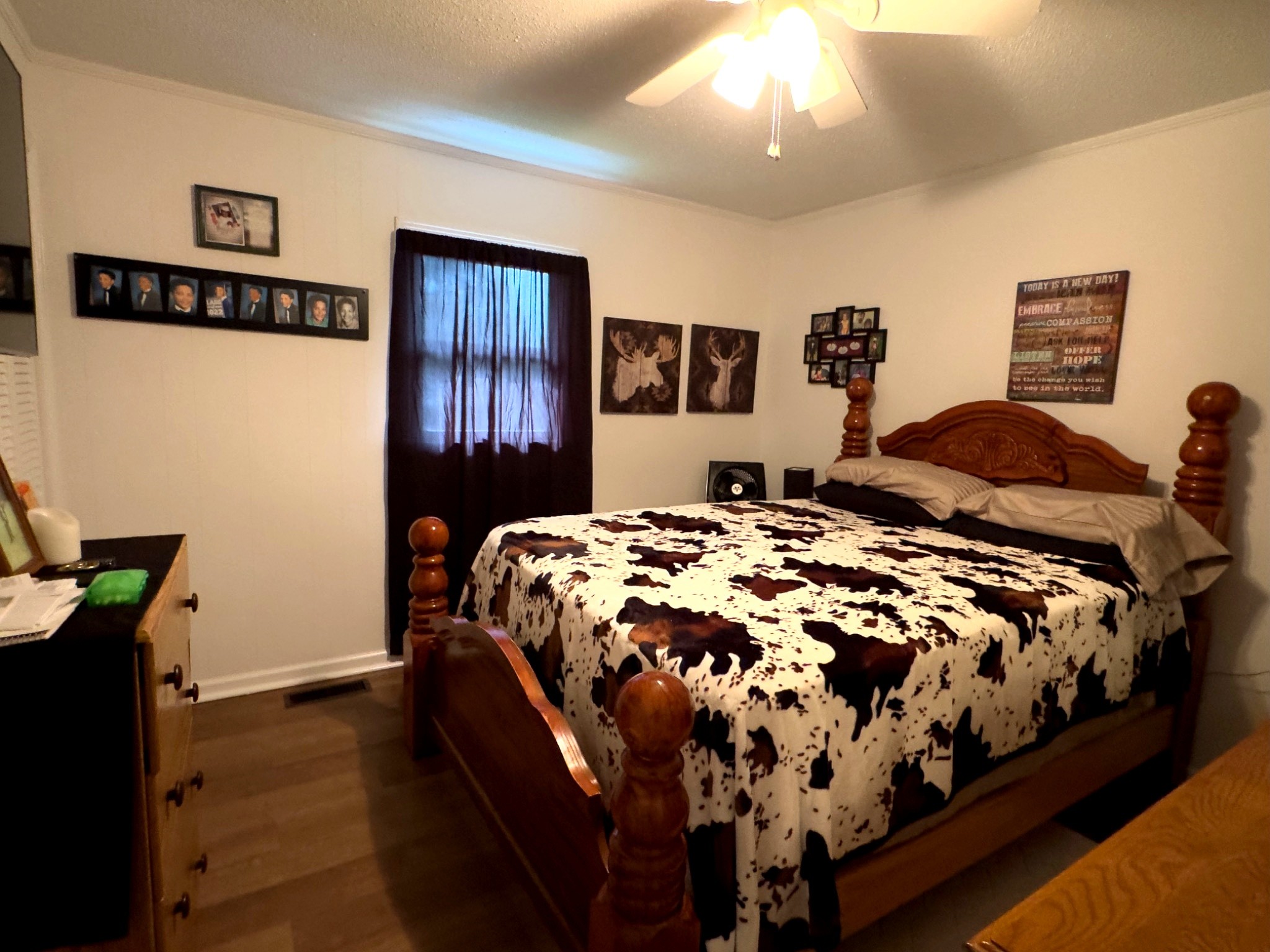 1344 Railroad Bed Road Collinwood, TN 38450 - Photo 13 of 40 a bedroom with a bed and lamp with window