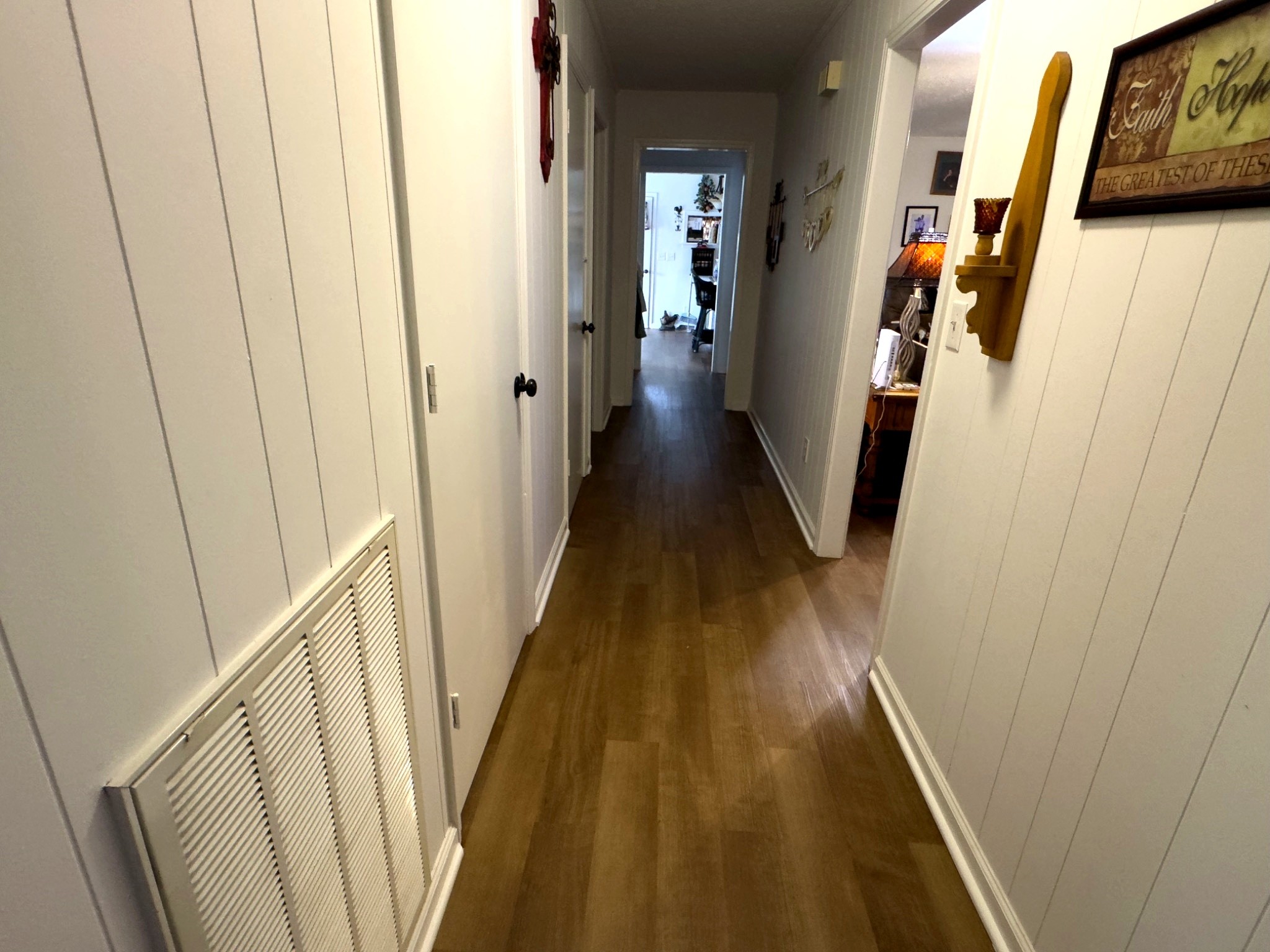 1344 Railroad Bed Road Collinwood, TN 38450 - Photo 18 of 40 a view of a hallway with wooden floor and stairs