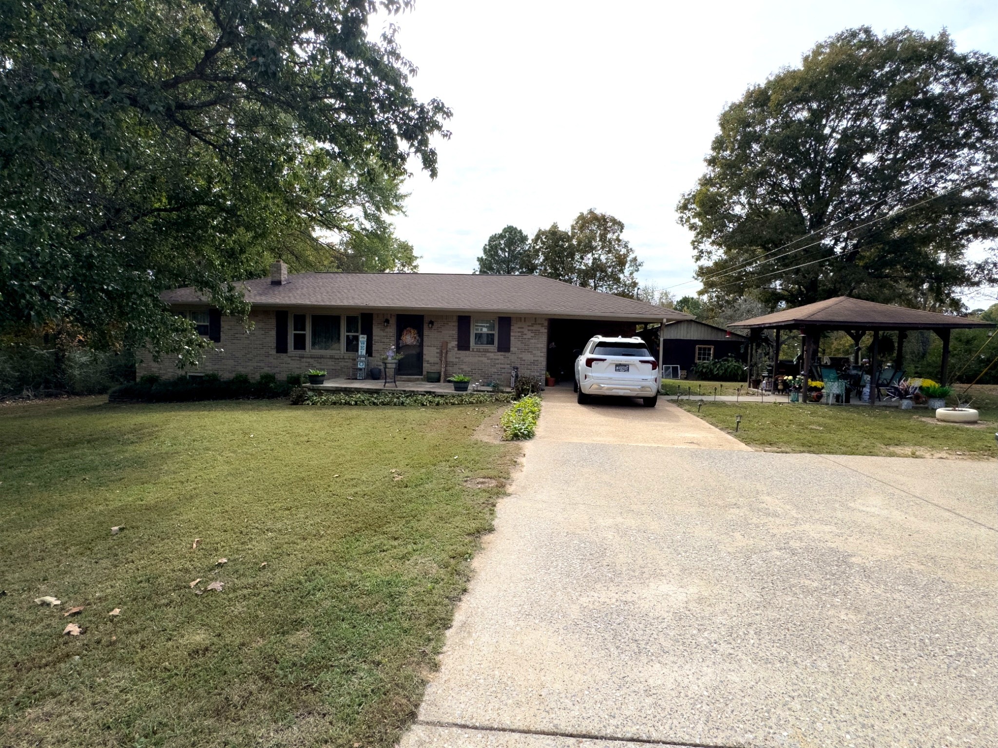 1344 Railroad Bed Road Collinwood, TN 38450 - Photo 25 of 40 a view of a house with swimming pool and sitting area