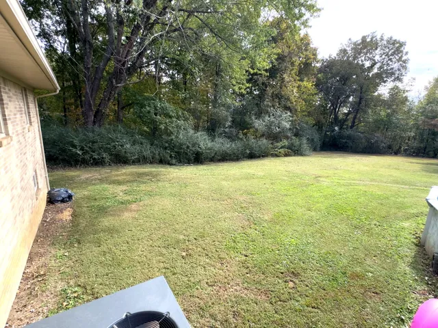 a room with water heater and a table