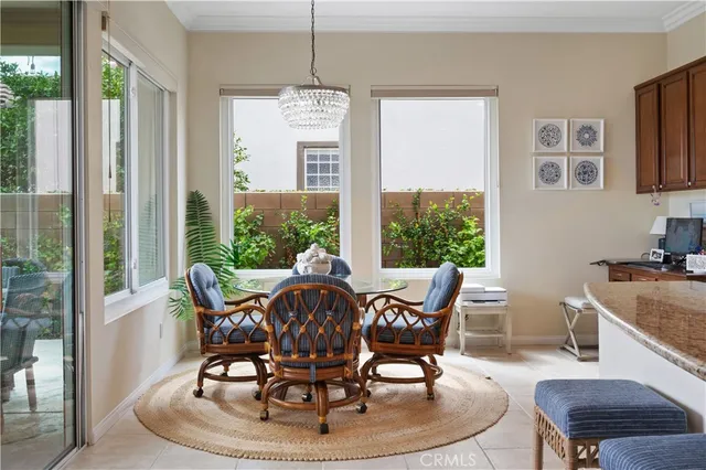 a kitchen with granite countertop a counter top space appliances and a cabinets