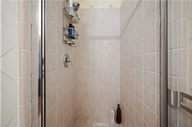 a view of a house with swimming pool and sitting area