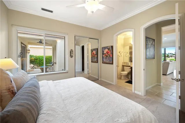 swimming pool view with a seating space and garden view
