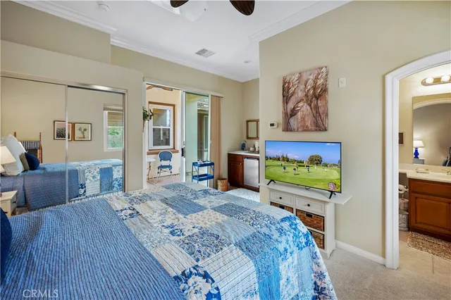 a view of a lake with houses in the back