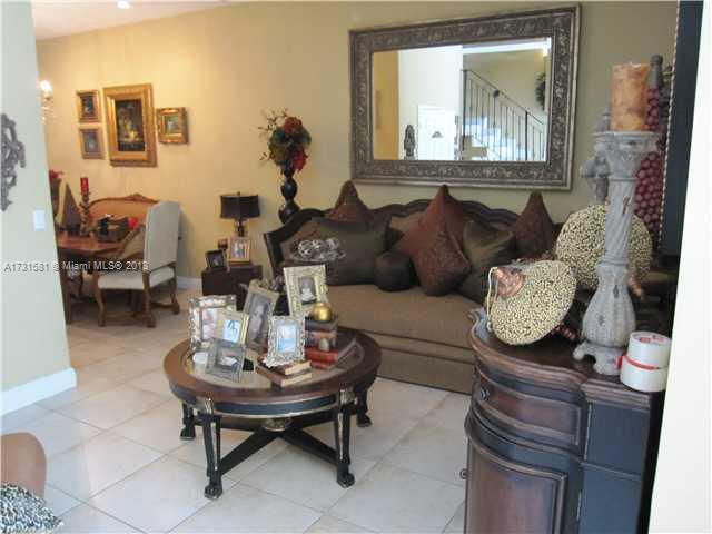 3749 Southwest 27th Lane, Unit 3749 Miami, FL 33134 - Photo 5 of 16 a living room with furniture and a window