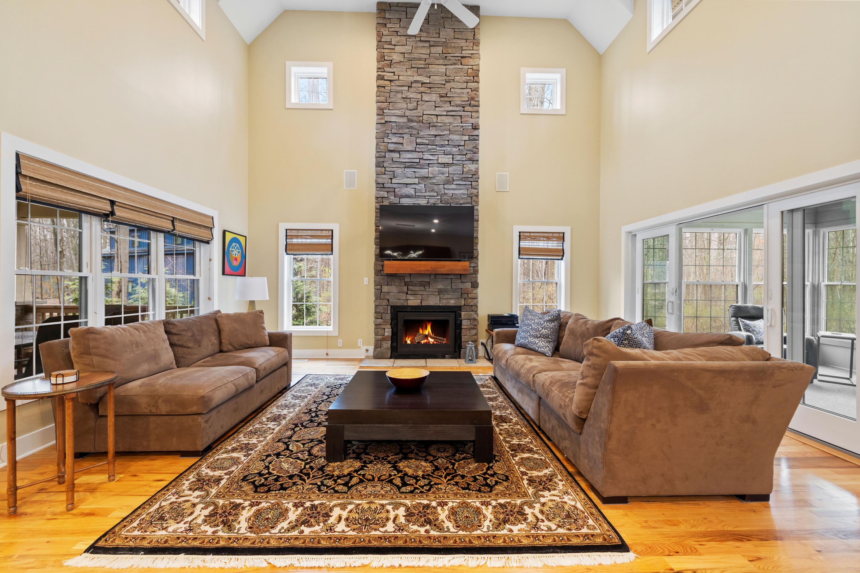 71 Timber Trail Michigan City, IN 46360 - Photo 6 of 27 a living room with furniture a rug a window and a fireplace