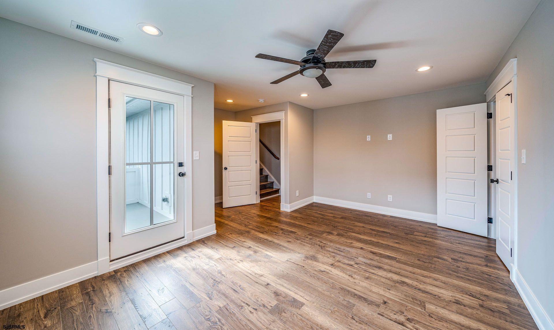 4 Wesley Road Ocean City, NJ 08226 - Photo 16 of 44 a view of an empty room and wooden floor