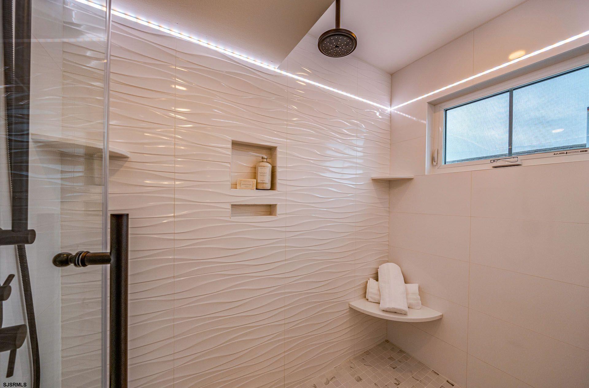 4 Wesley Road Ocean City, NJ 08226 - Photo 19 of 44 a bathroom with a toilet and a sink