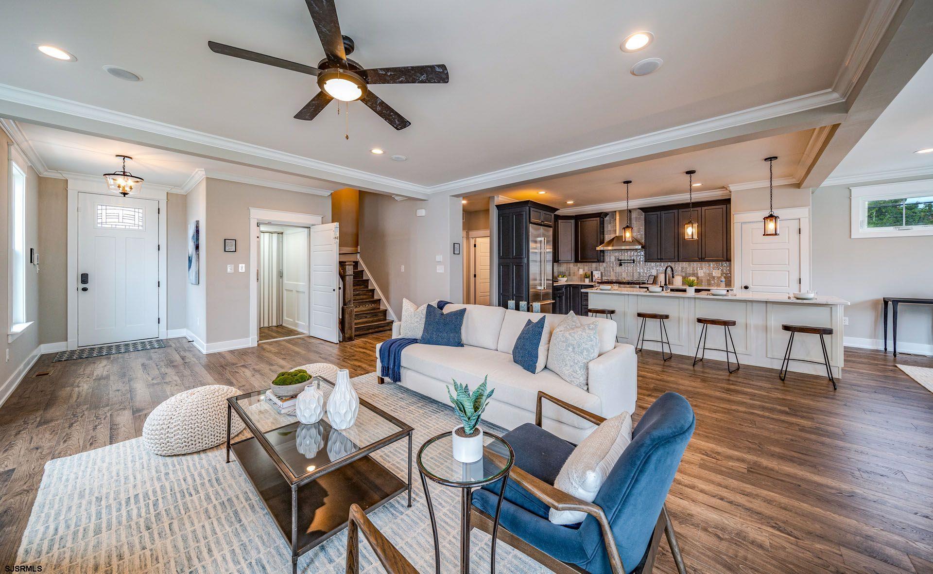 4 Wesley Road Ocean City, NJ 08226 - Photo 2 of 44 a living room with furniture and a wooden floor