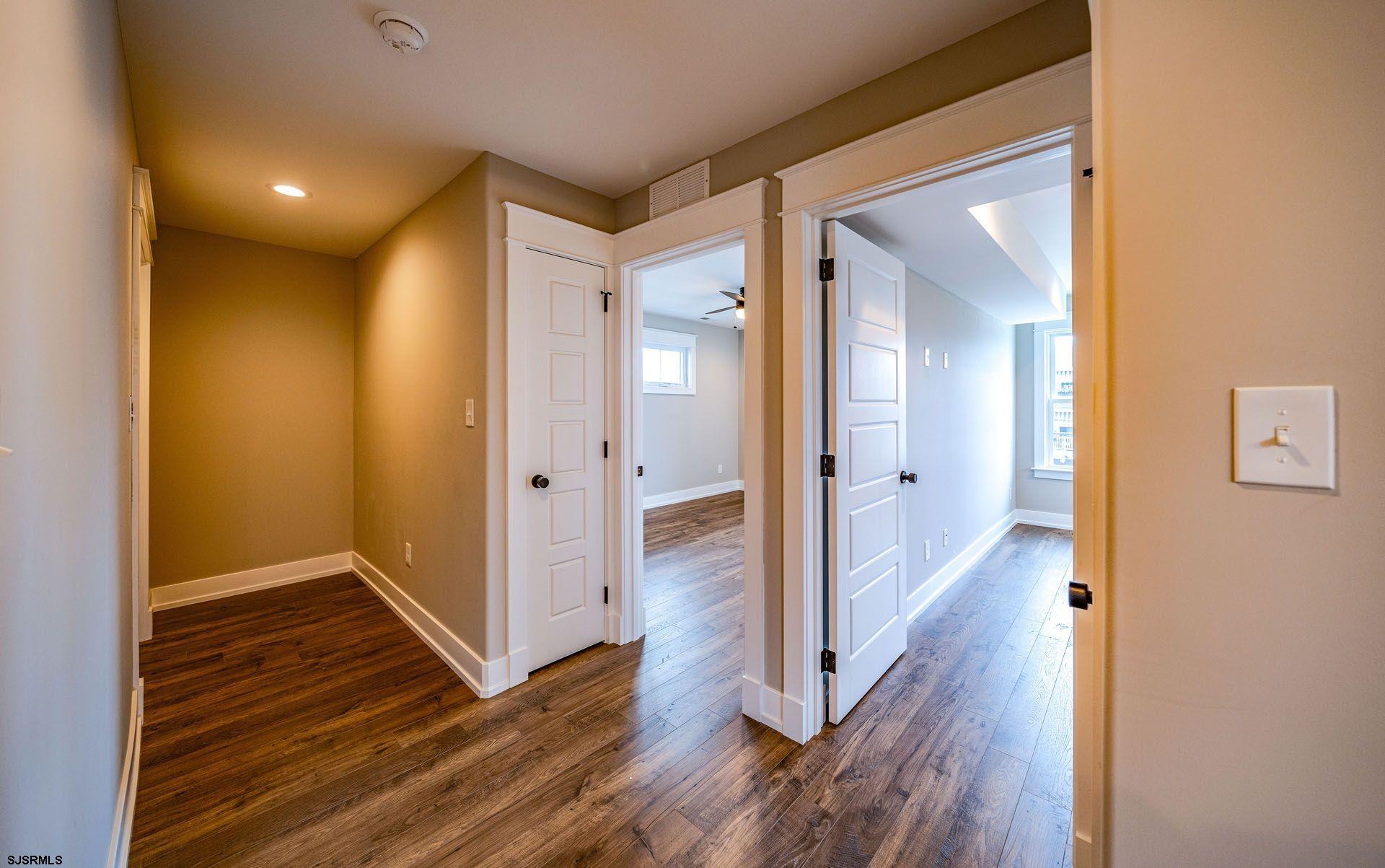 4 Wesley Road Ocean City, NJ 08226 - Photo 31 of 44 a view of a hallway with wooden floor