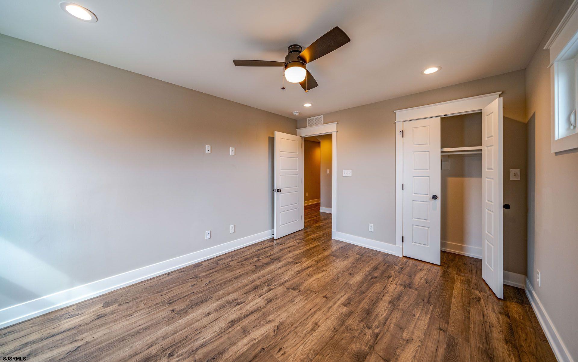 4 Wesley Road Ocean City, NJ 08226 - Photo 35 of 44 a view of an empty room and wooden floor