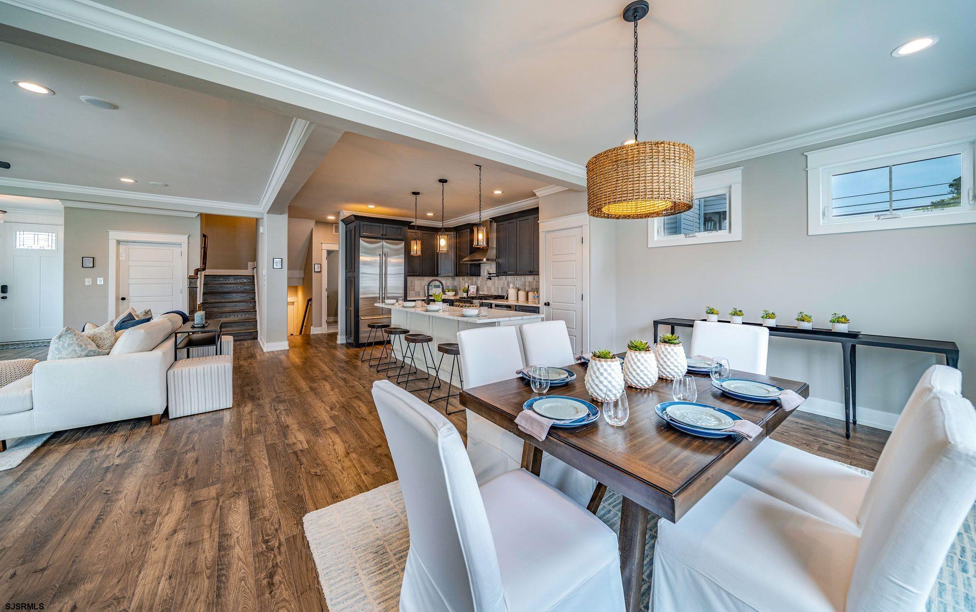 4 Wesley Road Ocean City, NJ 08226 - Photo 4 of 44 a view of a dining room with furniture and wooden floor