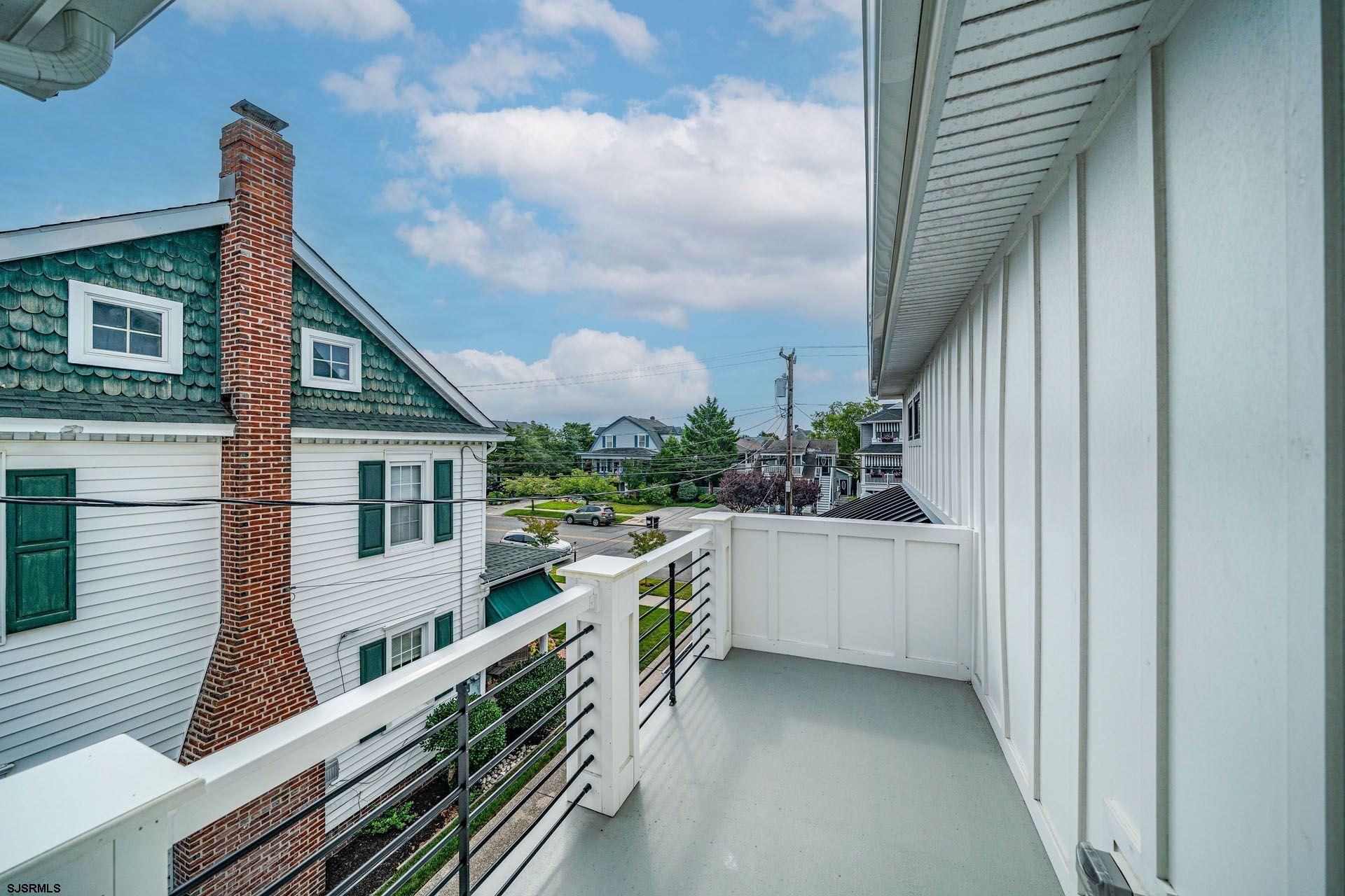 4 Wesley Road Ocean City, NJ 08226 - Photo 42 of 44 a view of balcony with outdoor kitchen