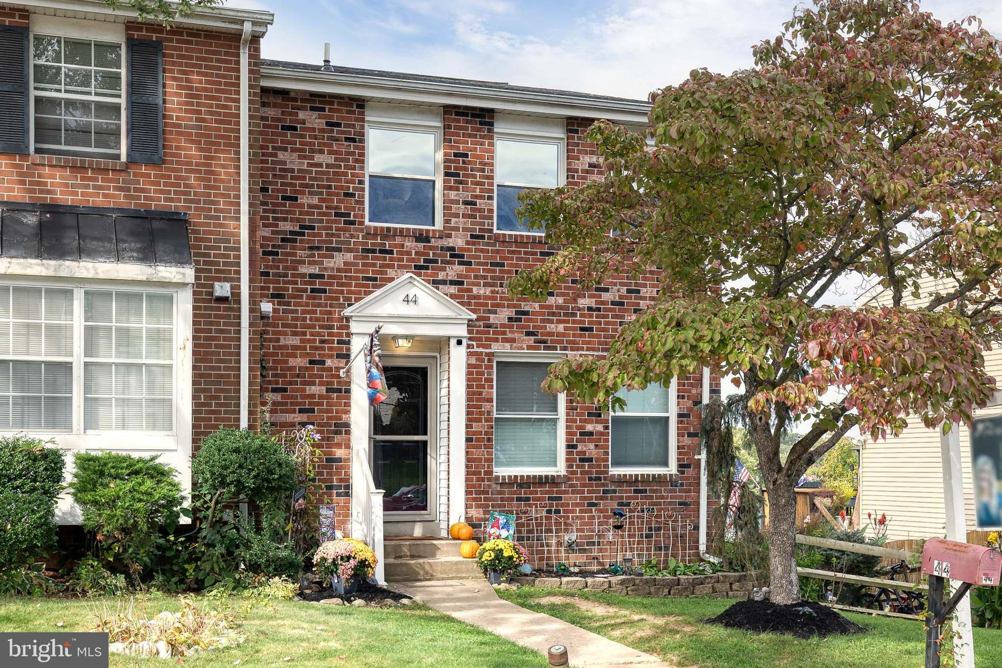 44 Perryfalls Place Baltimore, MD 21236 - Photo 2 of 19 front view of house with a yard