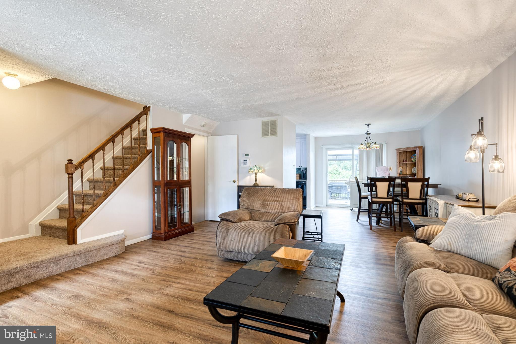 44 Perryfalls Place Baltimore, MD 21236 - Photo 3 of 19 a living room with furniture and wooden floor