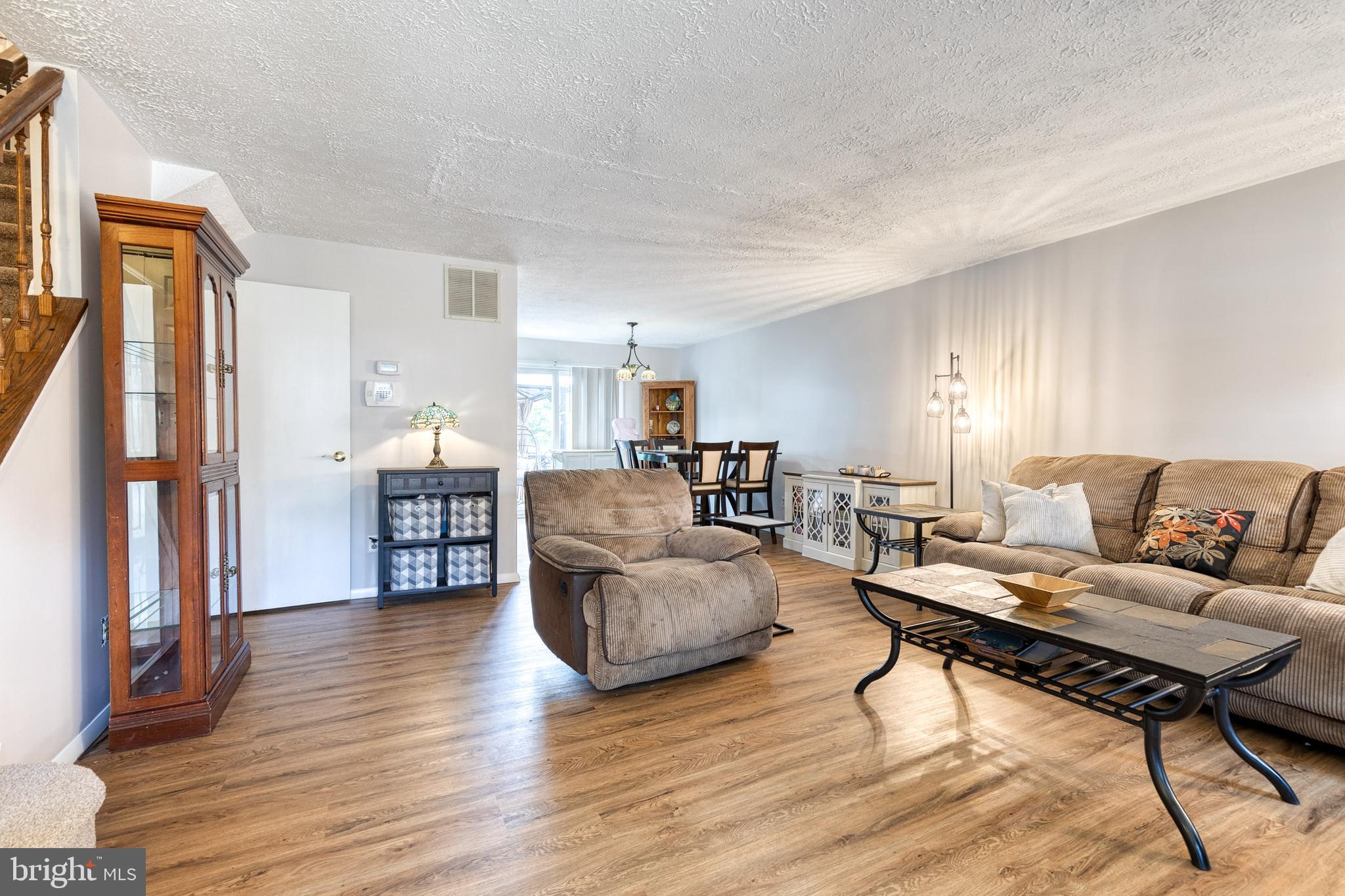 44 Perryfalls Place Baltimore, MD 21236 - Photo 6 of 19 a living room with furniture and a wooden floor