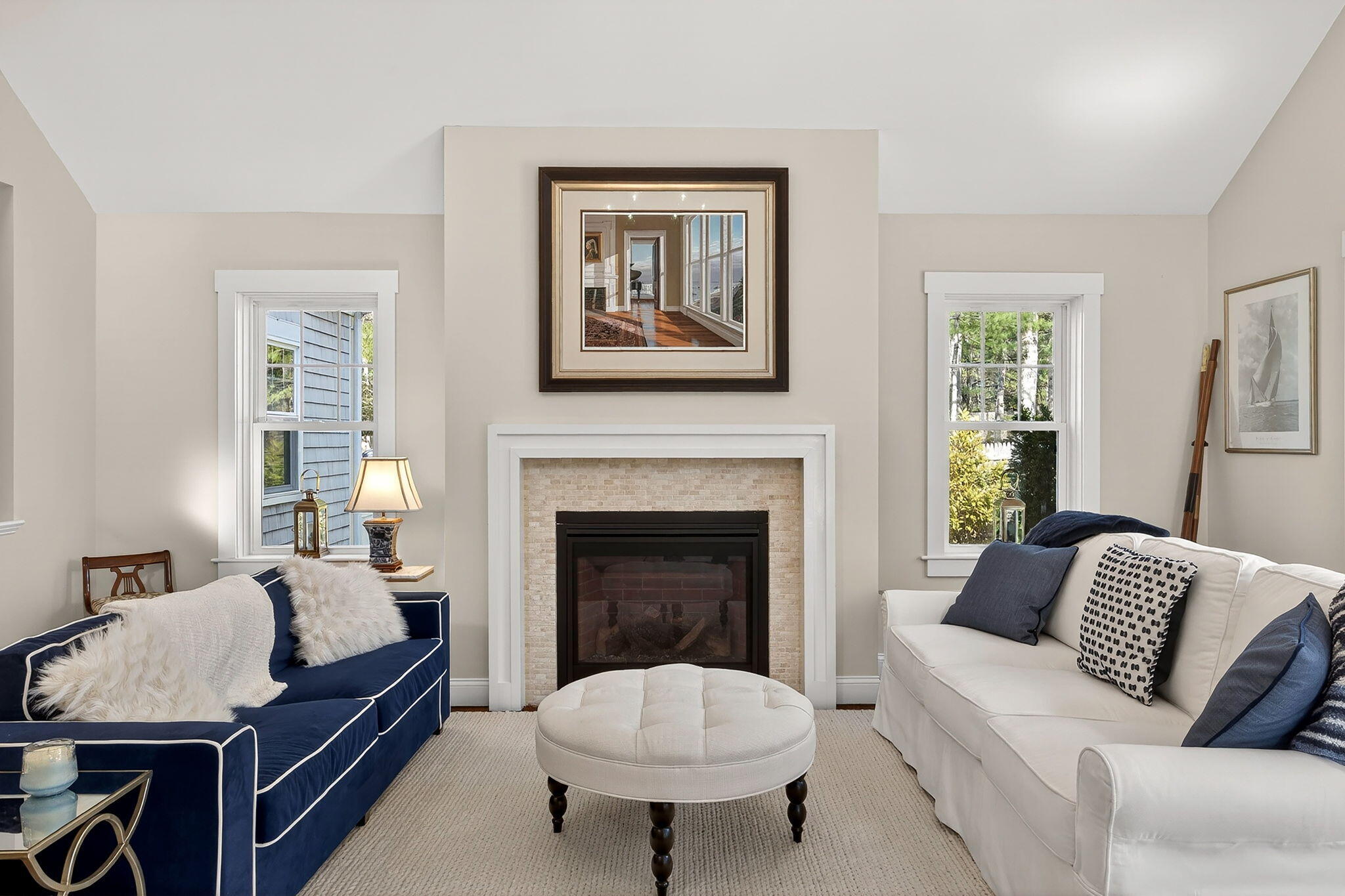 176 Bumps River Road Osterville, MA 02655 - Photo 15 of 54 a living room with furniture and a fireplace