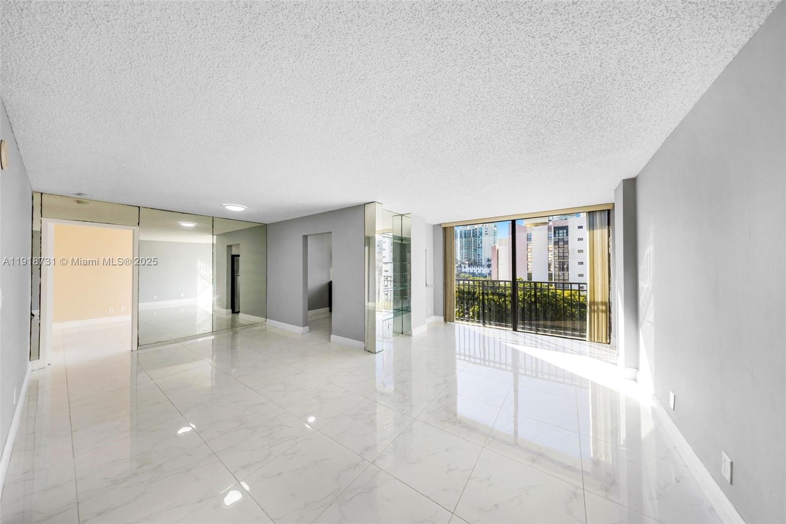 17011 North Bay Road, Unit 718 Sunny Isles Beach, FL 33160 - Photo 11 of 24 a view of an empty room with a window