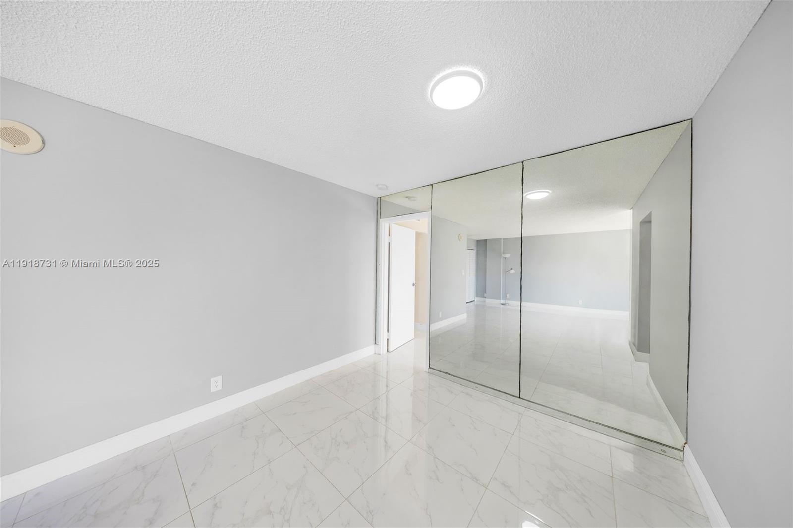17011 North Bay Road, Unit 718 Sunny Isles Beach, FL 33160 - Photo 13 of 24 a view of an empty room