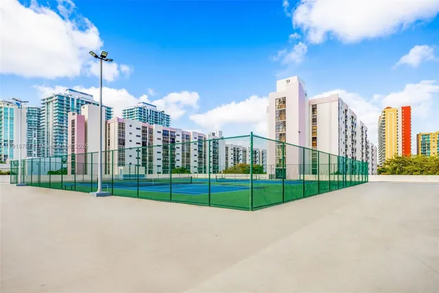 a view of a city street from a roof deck