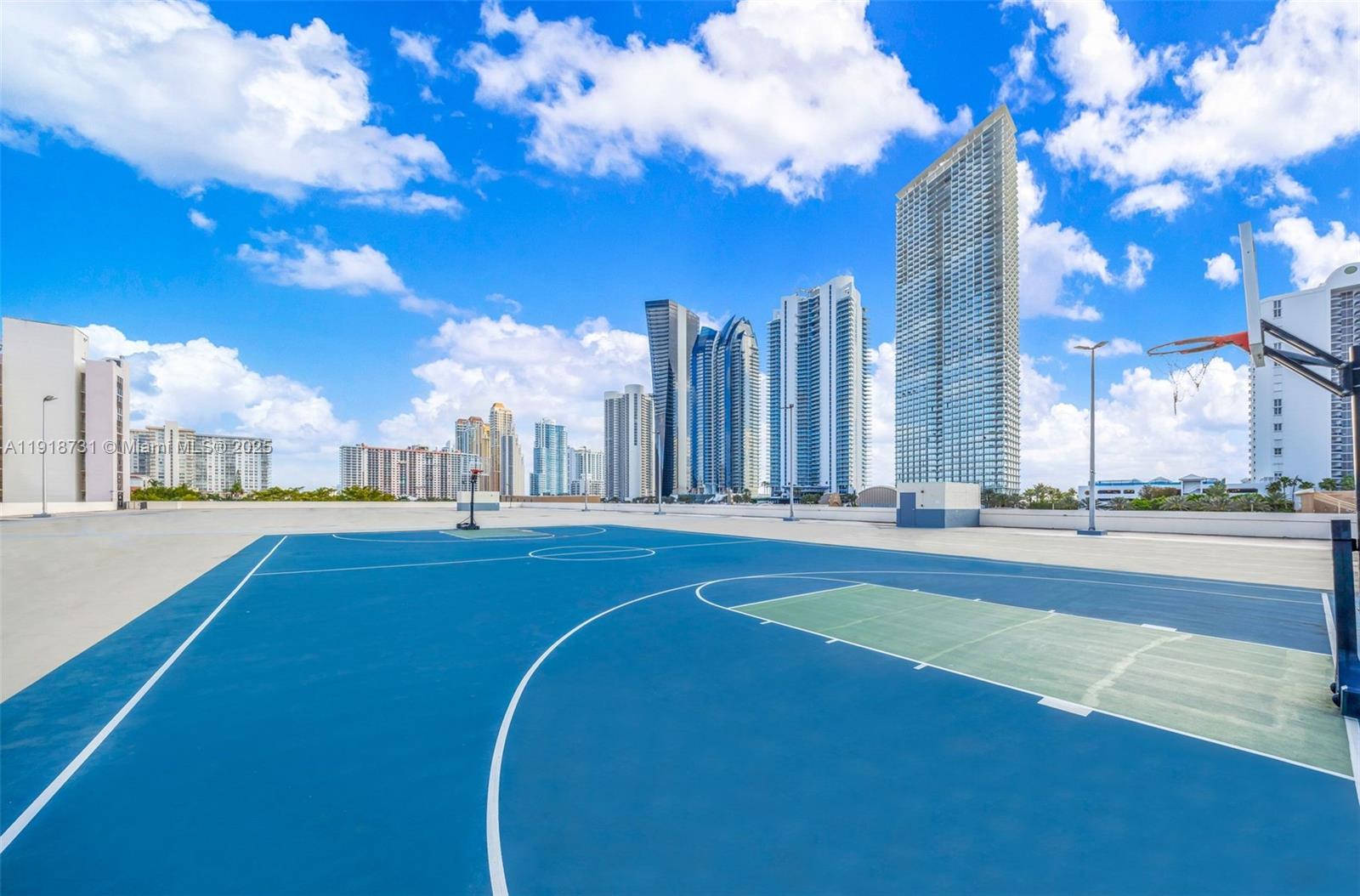 17011 North Bay Road, Unit 718 Sunny Isles Beach, FL 33160 - Photo 6 of 24 a view of a city with large trees