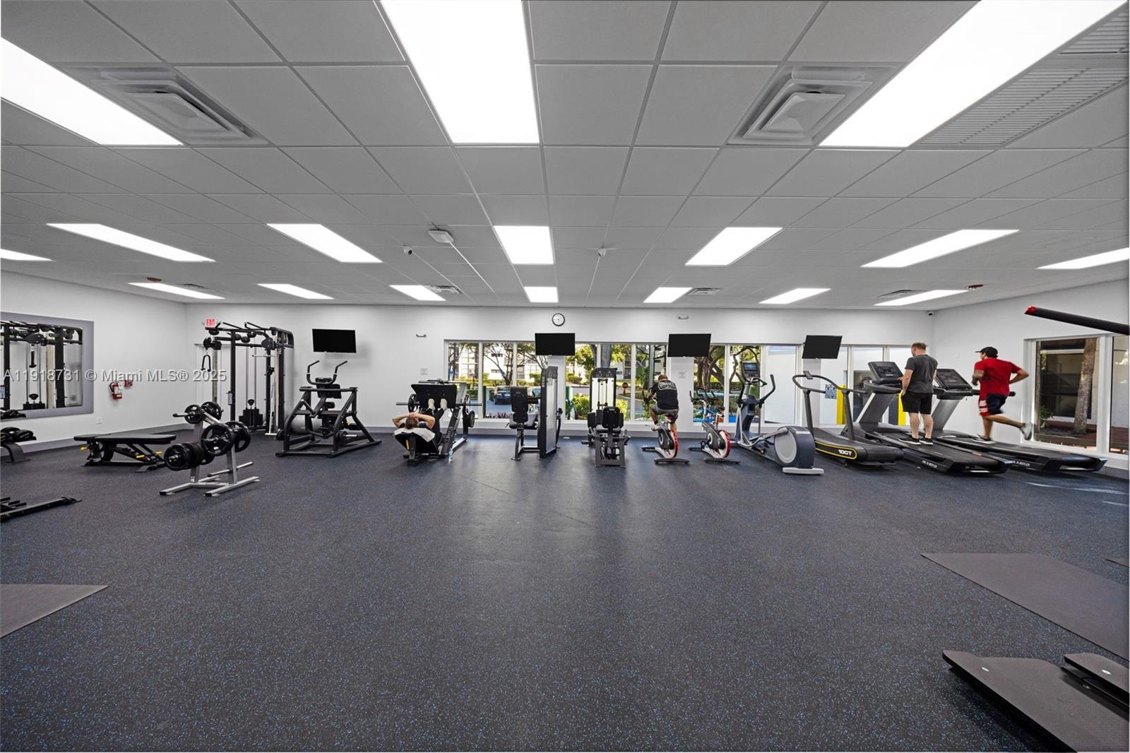 17011 North Bay Road, Unit 718 Sunny Isles Beach, FL 33160 - Photo 7 of 24 a view of a room with gym equipment