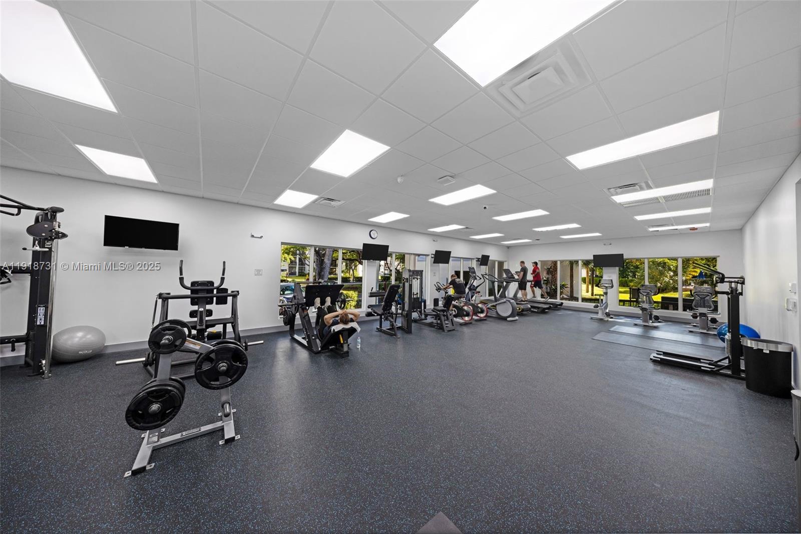17011 North Bay Road, Unit 718 Sunny Isles Beach, FL 33160 - Photo 8 of 24 a view of a room with gym equipment