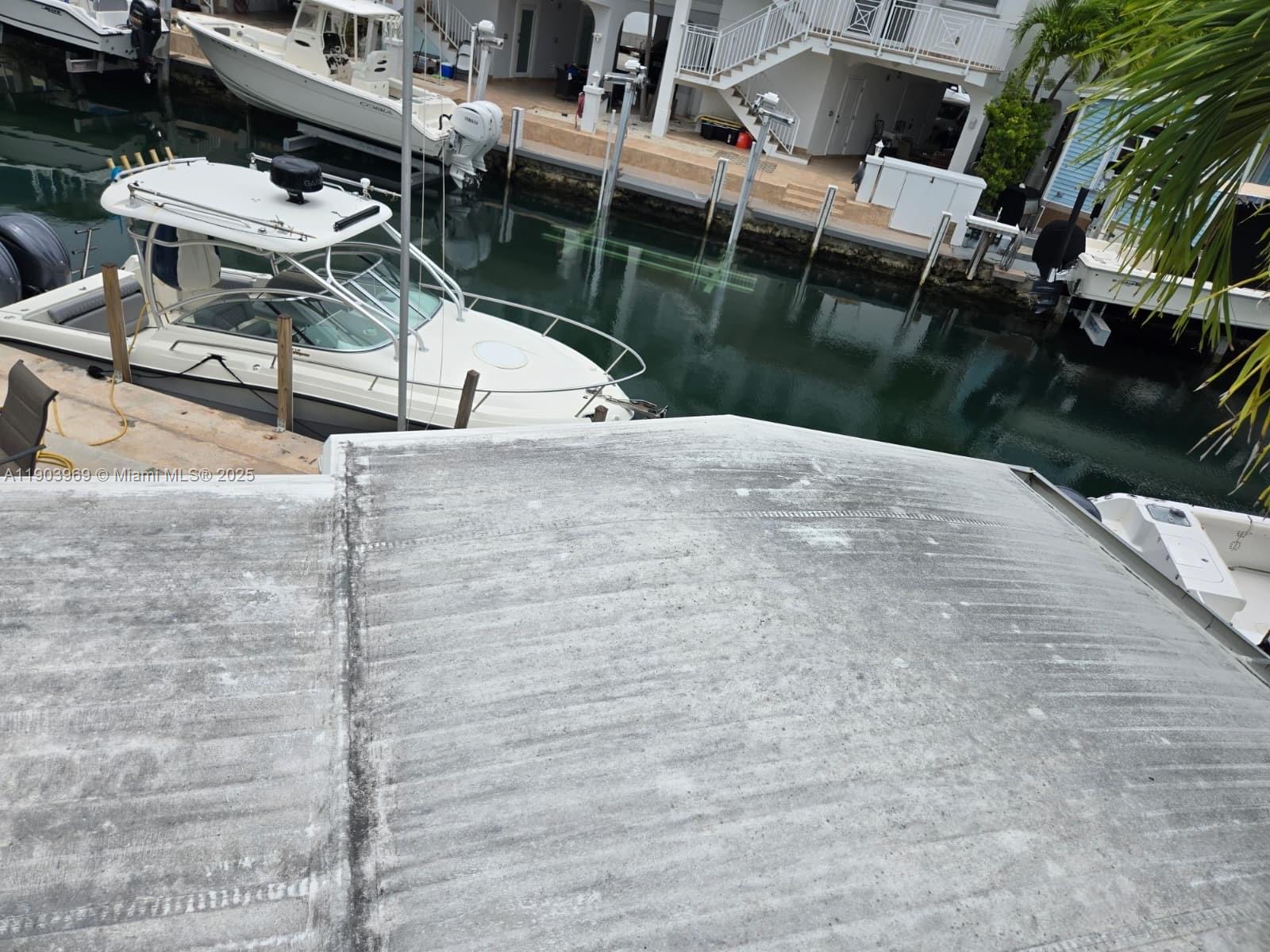 65821 Overseas Highway, Unit 114 Long Key, FL 33001 - Photo 6 of 7 a aerial view of a house with a yard