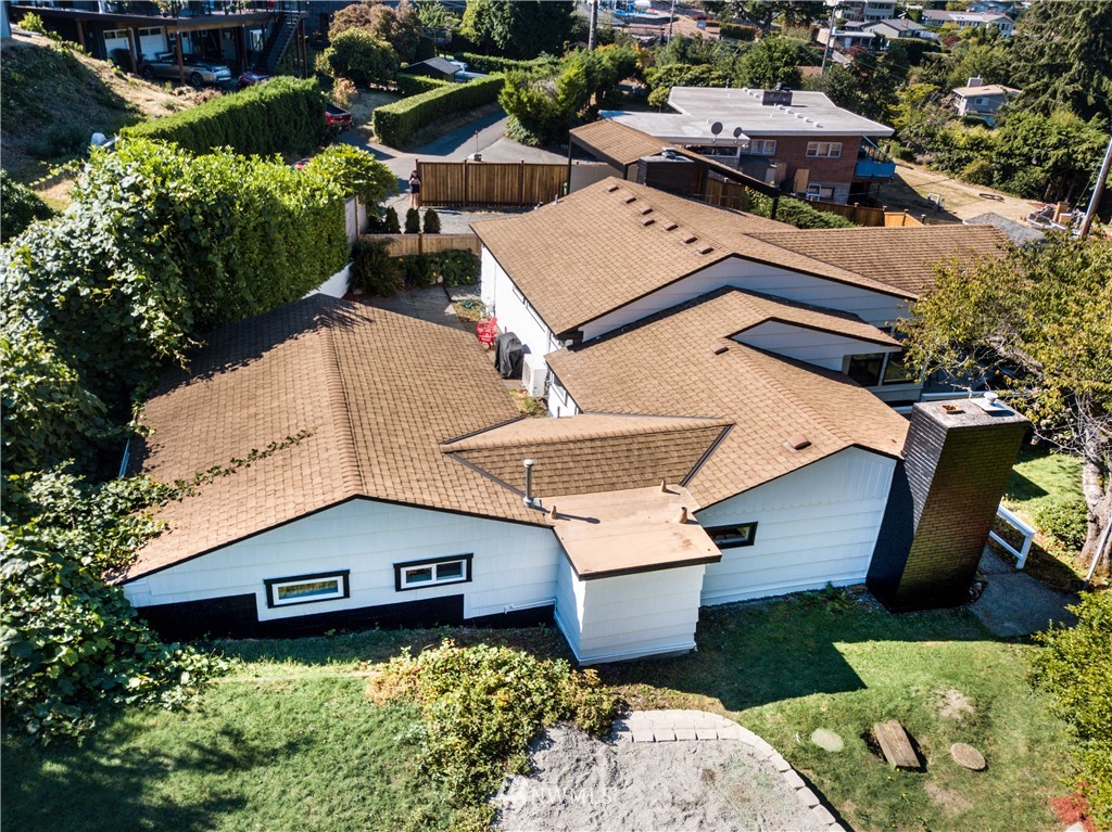 4401 Sunset Beach Road West University Place, WA 98466 - Photo 14 of 40 an aerial view of a house with garden space and street view