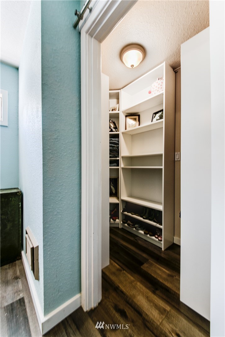 4401 Sunset Beach Road West University Place, WA 98466 - Photo 27 of 40 a storage room with washer and dryer
