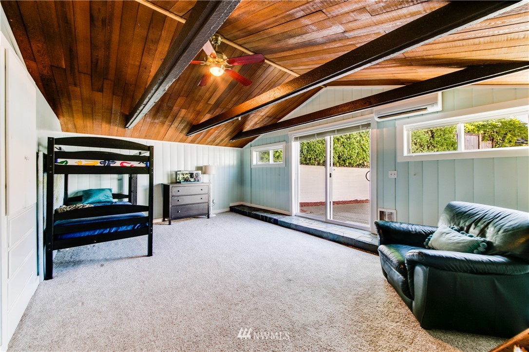4401 Sunset Beach Road West University Place, WA 98466 - Photo 29 of 40 a living room with furniture and a window
