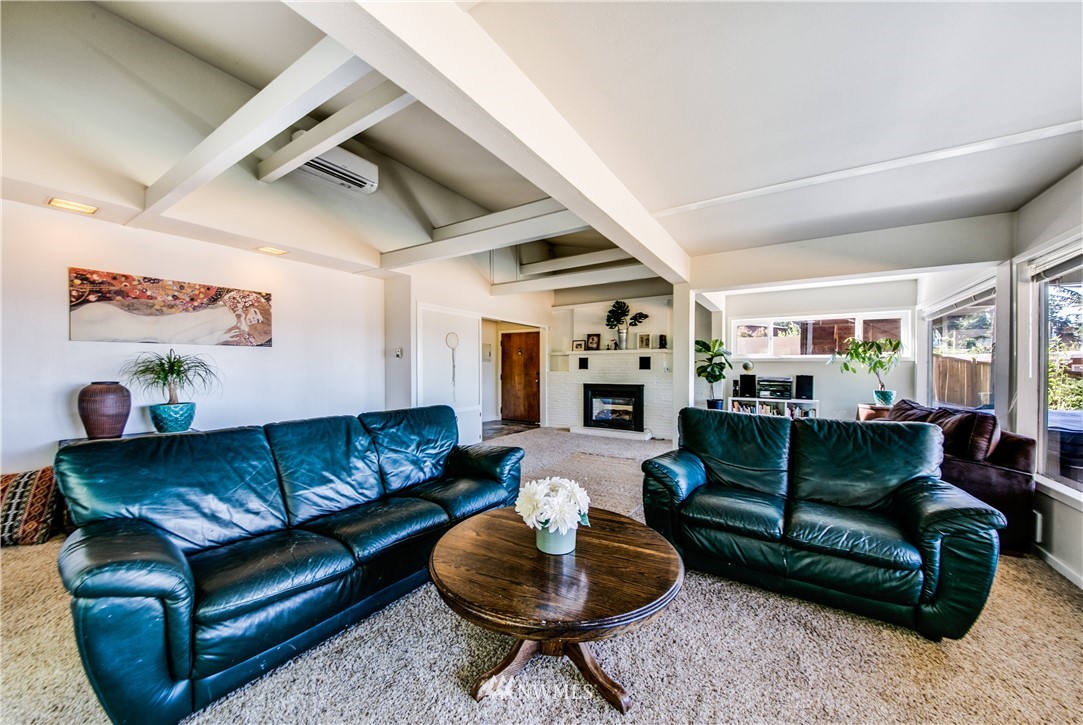4401 Sunset Beach Road West University Place, WA 98466 - Photo 6 of 40 a living room with furniture and a wooden floor