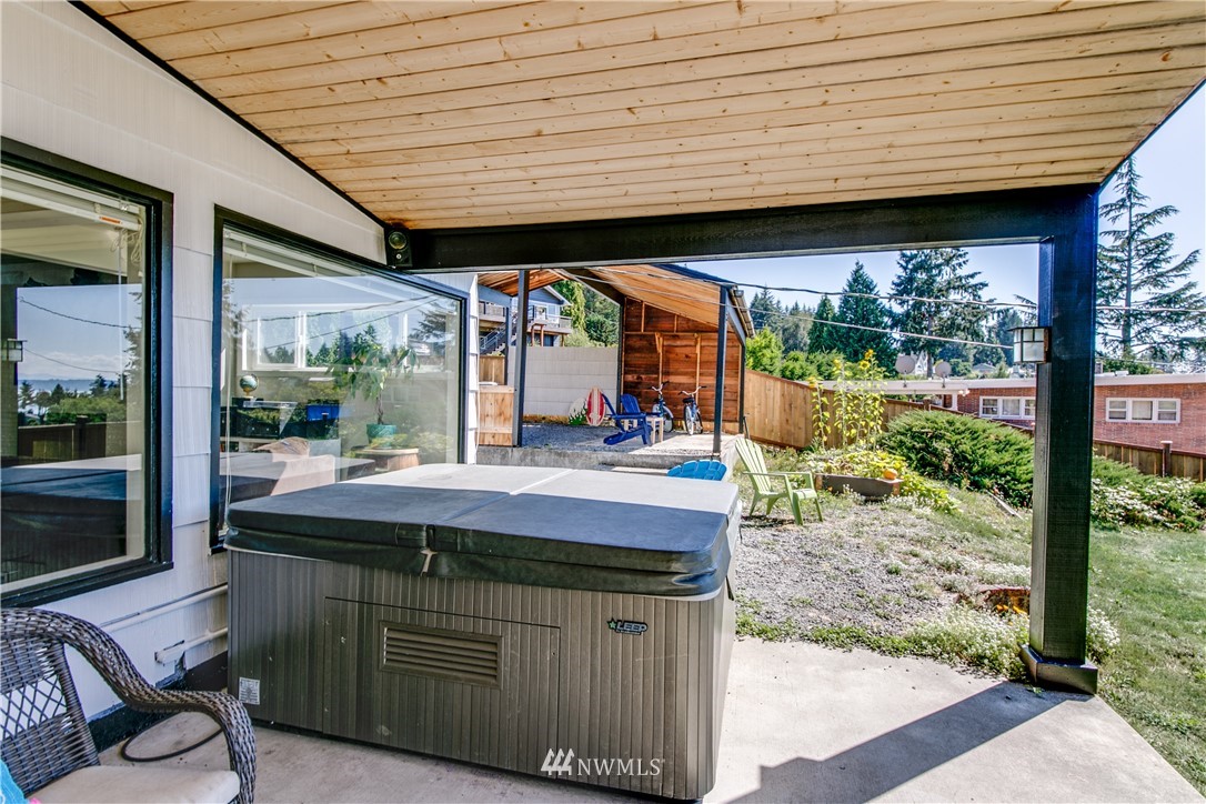 4401 Sunset Beach Road West University Place, WA 98466 - Photo 10 of 40 a kitchen view with a table and chairs