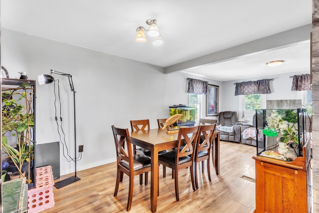 45 Ford Street, Unit A B Three Rivers, MA 01080 - Photo 26 of 42 a view of a dining room with furniture and a window
