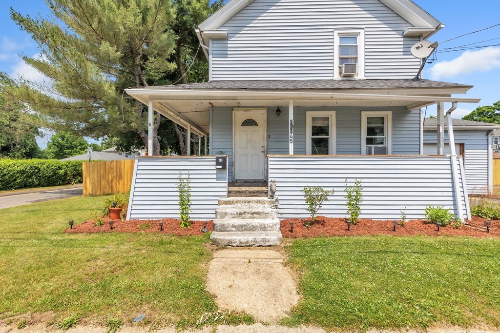 45 Ford Street, Unit A B Three Rivers, MA 01080 - Photo 3 of 42 a front view of a house with garden