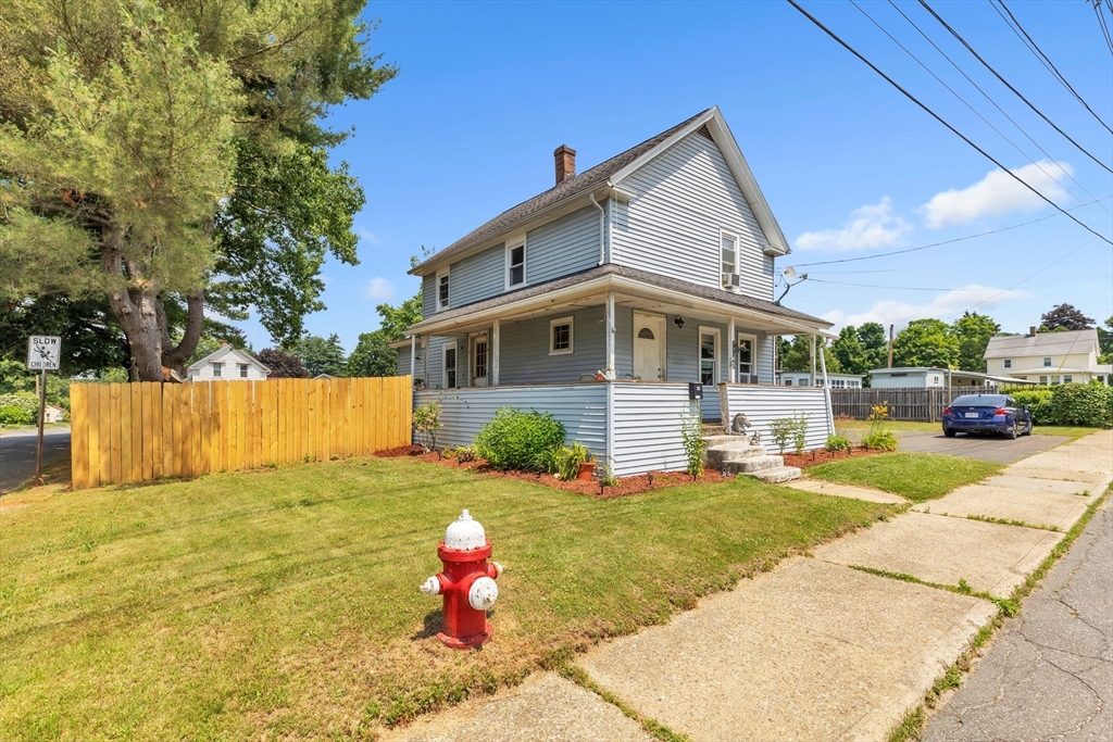 45 Ford Street, Unit A B Three Rivers, MA 01080 - Photo 4 of 42 a front view of a house with a yard