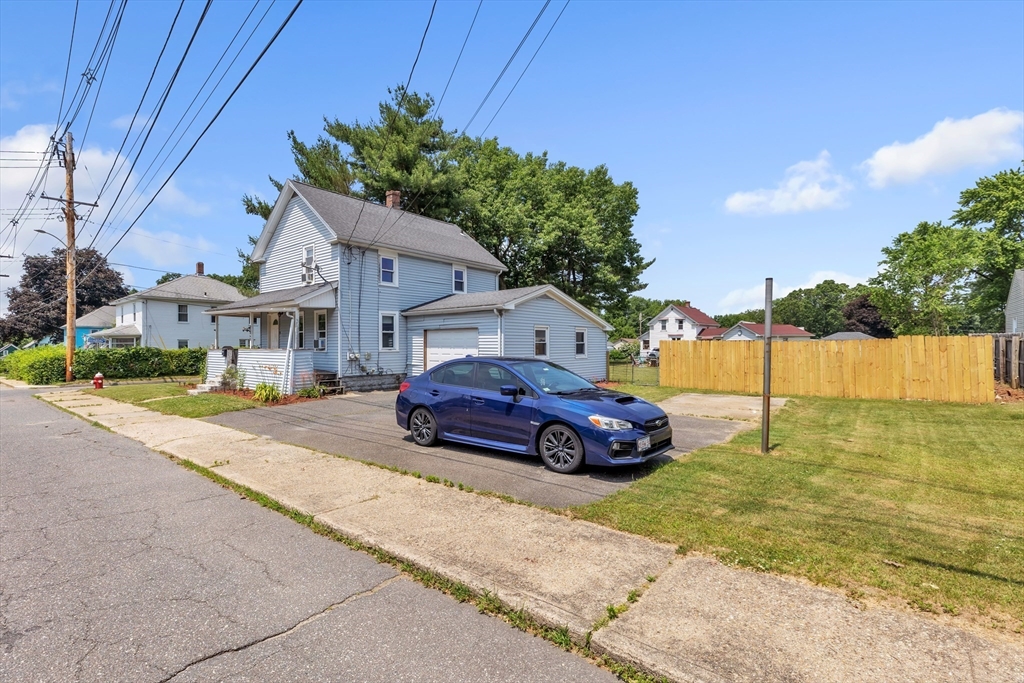 45 Ford Street, Unit A B Three Rivers, MA 01080 - Photo 42 of 42 a car parked in front of a house