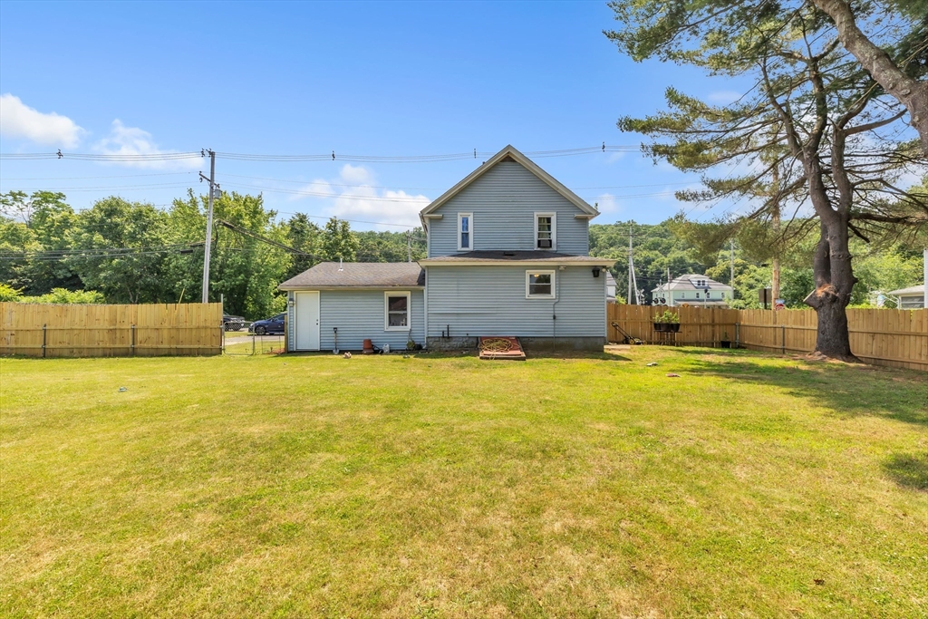 45 Ford Street, Unit A B Three Rivers, MA 01080 - Photo 10 of 42 a front view of a house with a yard