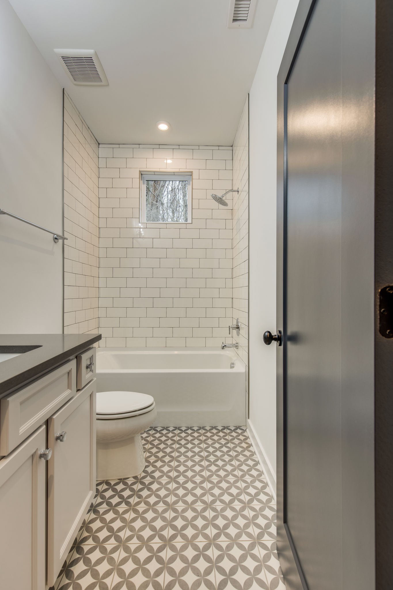 1005 B Mitchell Road Nashville, TN 37206 - Photo 15 of 25 a bathroom with a toilet a sink and a shower