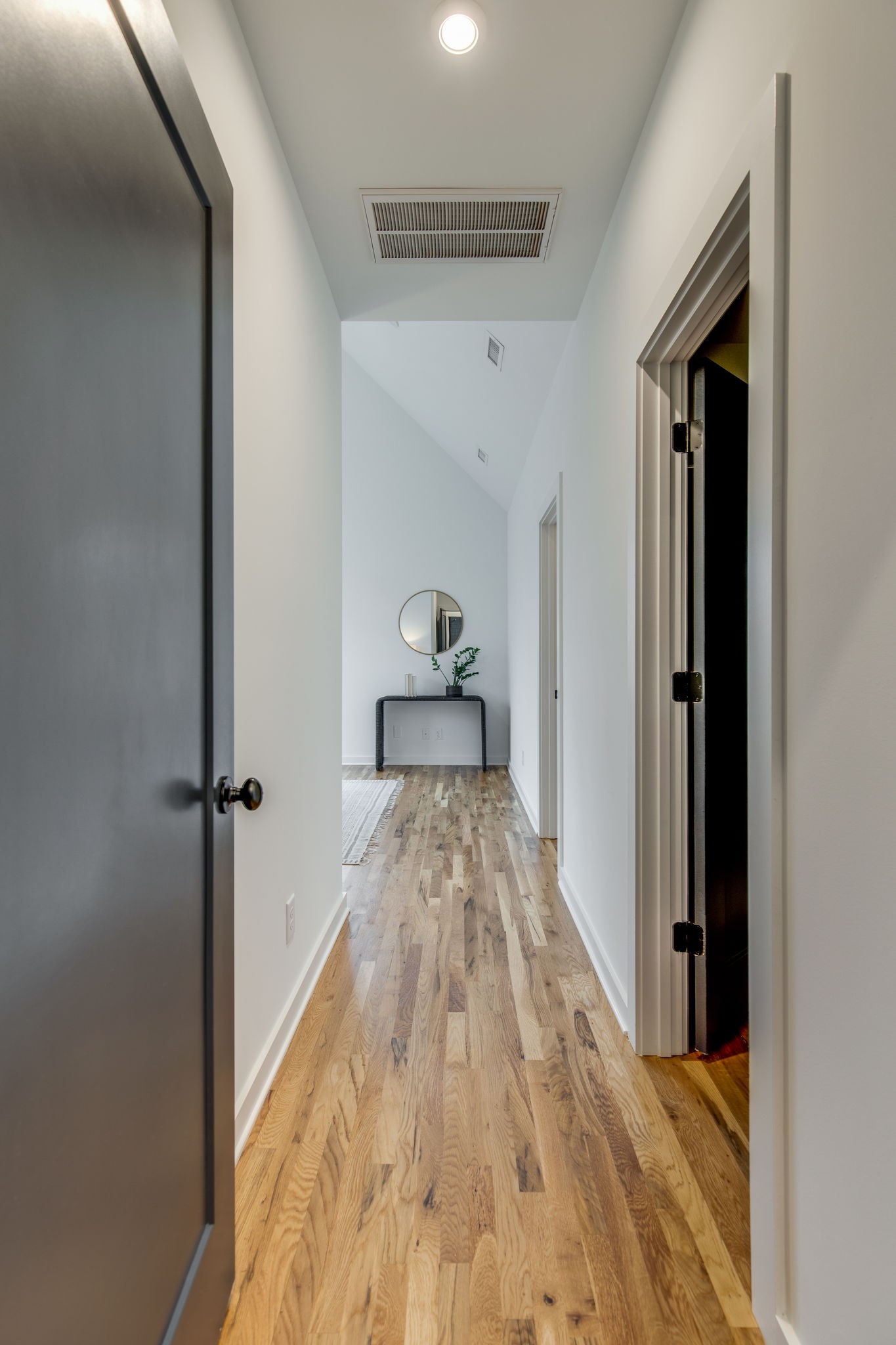 1005 B Mitchell Road Nashville, TN 37206 - Photo 19 of 25 a view of a hallway view with wooden floor and staircase