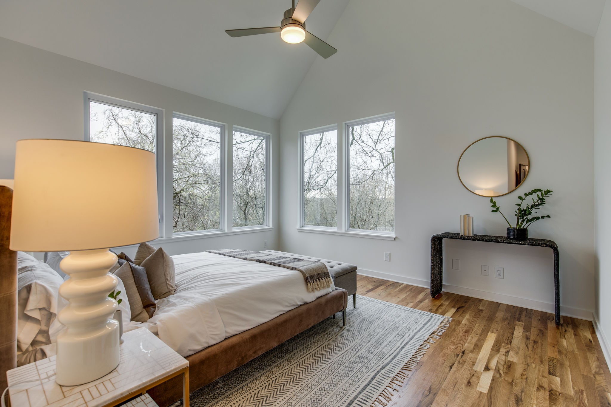 1005 B Mitchell Road Nashville, TN 37206 - Photo 8 of 25 a bedroom with a bed and wooden floor