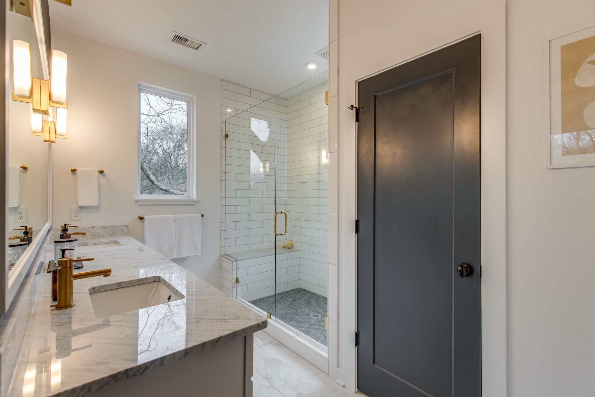 1005 B Mitchell Road Nashville, TN 37206 - Photo 10 of 25 a bathroom with a granite countertop sink mirror and a bathtub