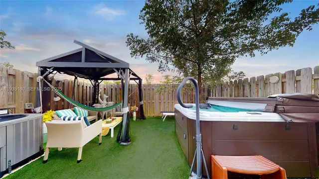 a view of a house with a sink and garden