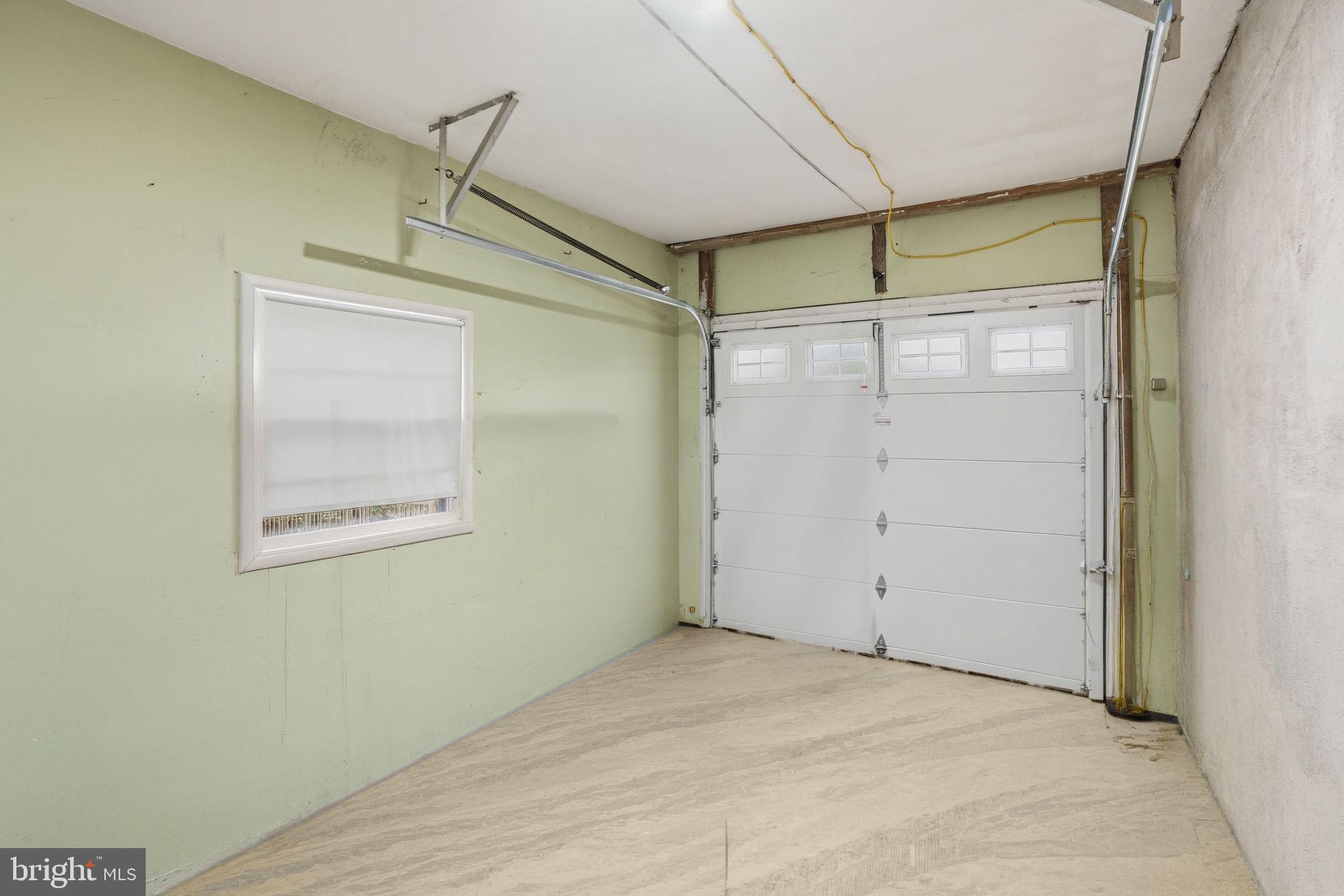 303 Radcliffe Road Glenside, PA 19038 - Photo 25 of 36 an empty room with a glass door