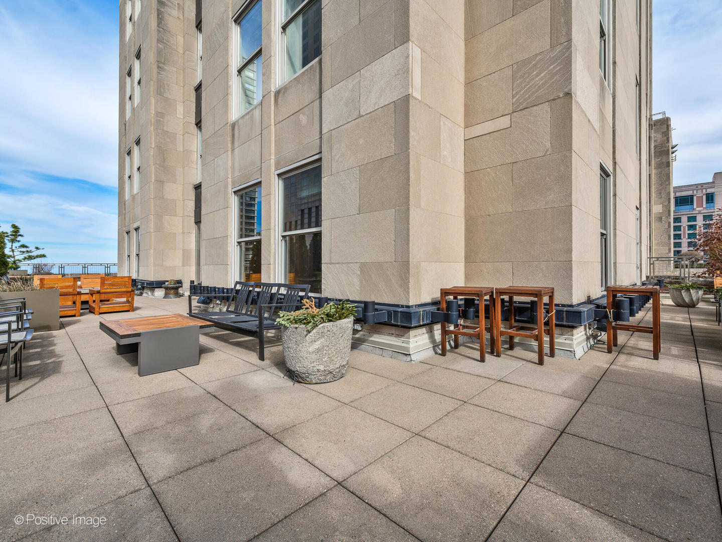159 East Walton Place, Unit 18A Chicago, IL 60611 - Photo 50 of 54 an outdoor space with patio furniture and potted plants