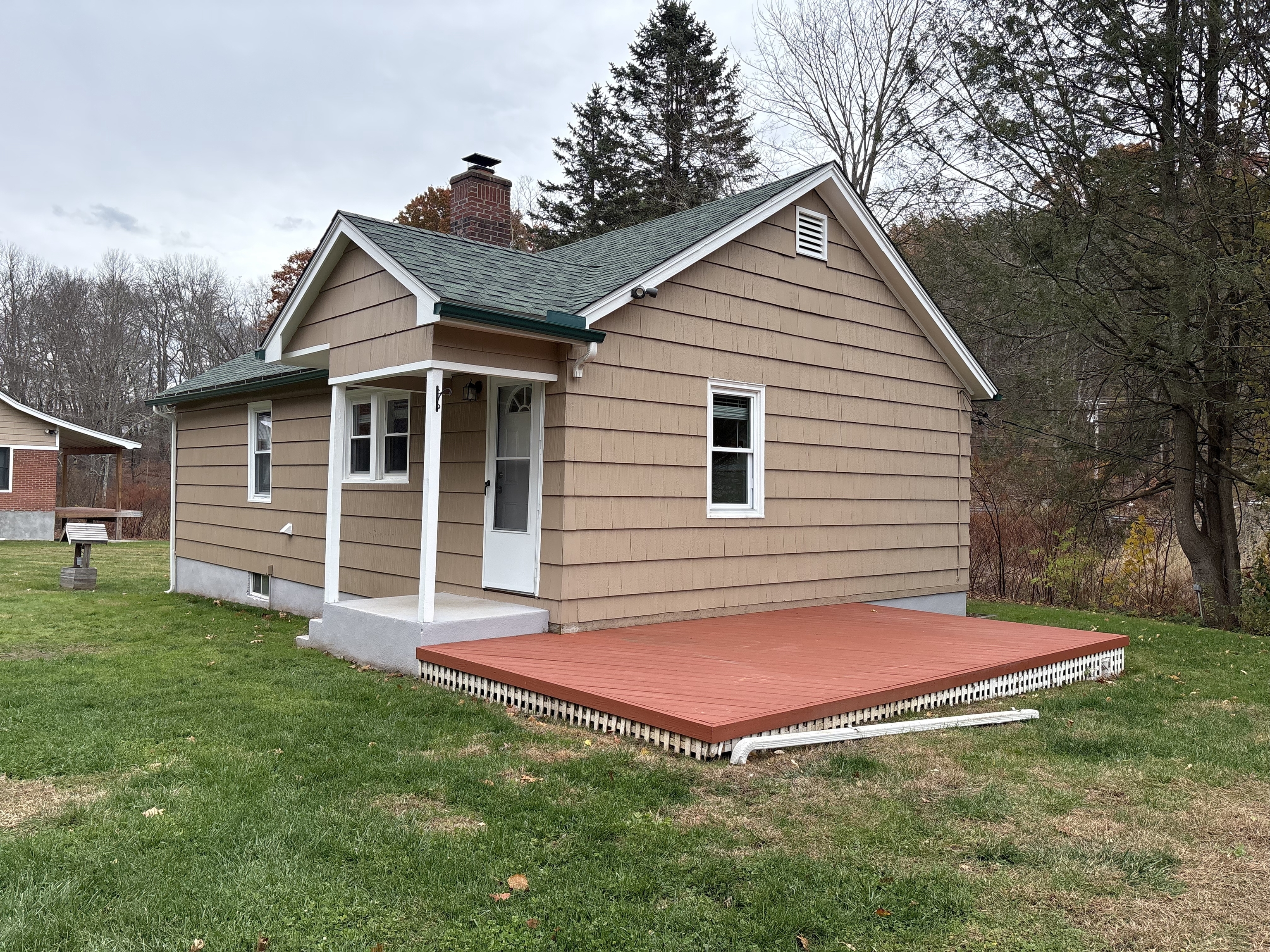 690 Greystone Road Plymouth, CT 06782 - Photo 12 of 16 a view of a house with a yard