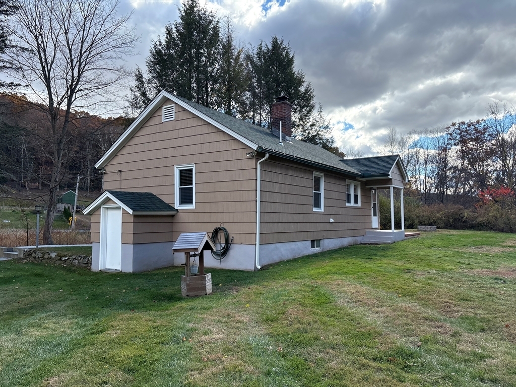 690 Greystone Road Plymouth, CT 06782 - Photo 14 of 16 a view of a house with a yard