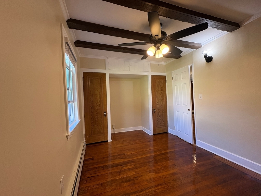 690 Greystone Road Plymouth, CT 06782 - Photo 9 of 16 a view of empty room with wooden floor